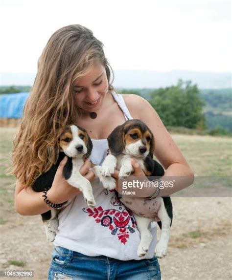 dog licking teen pussy|163 Fotos und hochauflösende Bilder zu Dog Licks Teenage Girl